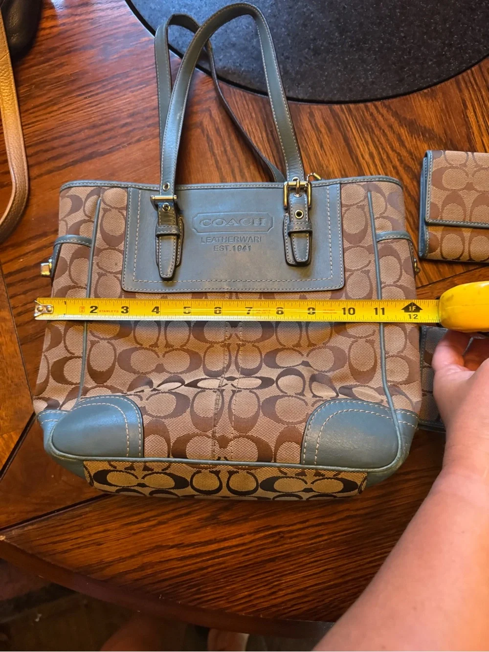 Coach Khaki Signature Canvas Tote with Blue Trim with check book and wallet.